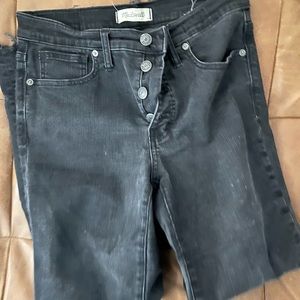 Black Madewell 9” high rise jean. Fringed bottom